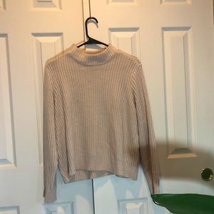 Pink turtleneck sweater